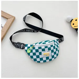 Detail of green checkerboard kids waist bag with ADDR patch and logo strap