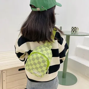 Kids green checkerboard crossbody chest bag with adjustable strap and fashion patch