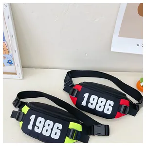 Detail of adjustable waist bags in color-block canvas with bold 1986 numeric print