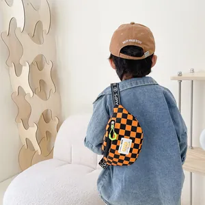 Kid's trendy orange and black checkerboard fanny pack with stylish lettered strap