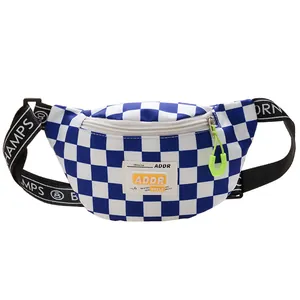 Kids checkered sling bag in blue and white with neon zipper and sporty shoulder strap