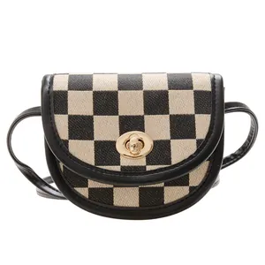 Kids vintage checkerboard saddle bag with black leather trim and golden metal clasp