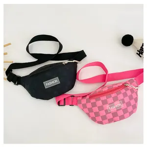 Close-up of kids waist bags in black texture and pink checkerboard with adjustable straps