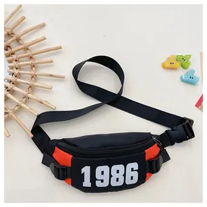 Close-up of checkerboard kids chest bag with 1986 print and adjustable strap