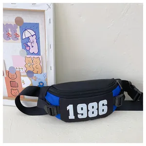 Close-up of sporty crossbody bag featuring blue and black nylon with 1986 print