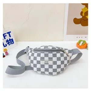 Detail view of grey and white checkered waist bag with FASHION logo and adjustable strap