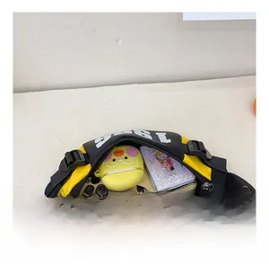 Detailed view of kids checkered fanny pack interior with large storage capacity