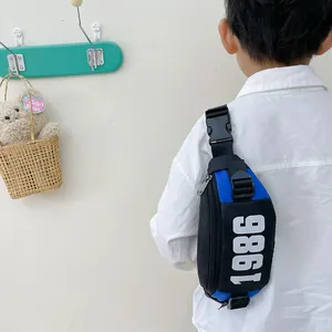 Kids trendy blue and black crossbody chest bag with 1986 print for boys and girls