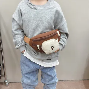 Kids chest bag in brown and cream contrast color with adjustable strap and 'P' detail