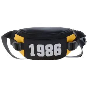 Kids black and yellow checkerboard chest bag with 1986 print and adjustable strap