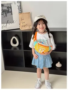 Kids colorful waist bag featuring Superstar 12 print worn by a young boy in a room