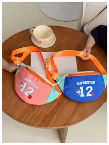 Close-up of waterproof nylon kids fanny packs with adjustable orange straps and superstar logo