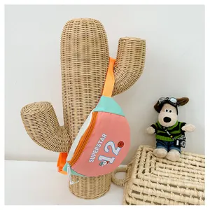Detailed view of colorful kids chest bag with Superstar print on cactus display