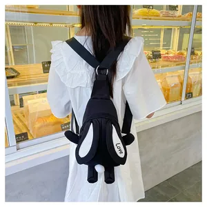 Detailed back view of a cute plush rabbit crossbody bag with adjustable strap for kids