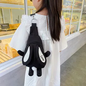 Cute black rabbit cartoon crossbody bag for kids featuring 3D ears and white pompom detail