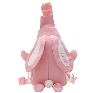 Cute pink cartoon bunny crossbody bag for kids with long ears and plush tail detail