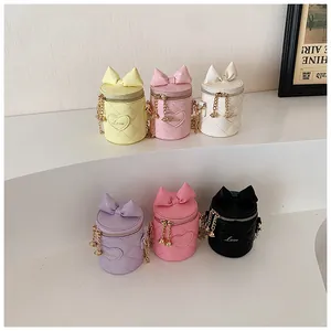 Detailed collection of quilted mini bucket bags in six pastel colors with bow decoration