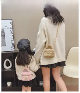 Quilted plush chain bags in khaki and pink worn by mother and child in a cozy setting
