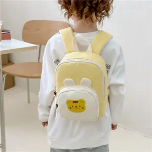 Minimalist kids backpack with cartoon bunny ears in vibrant yellow and white canvas style