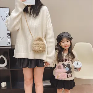 Plush quilted crossbody bag with gold chain and flower charm for women and kids