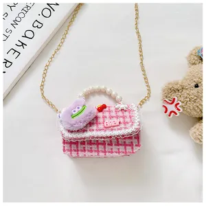 Roze geruite handtas voor meisjes met parelhandvat, kant en cartoon monster decoratie