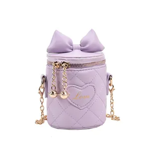 Purple quilted bucket bag for girls with bow, heart embroidery and gold chain strap