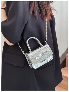 Silver metallic PU leather crossbody bag with embossed texture and metal ball chain strap