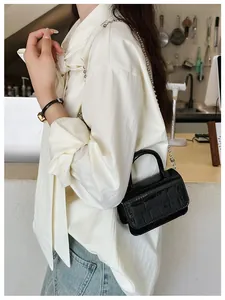 Mini black crocodile pattern PU leather crossbody bag with stylish gold ball chain strap
