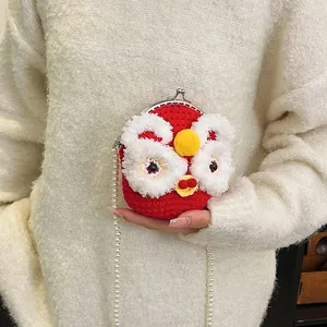 Handmade red knit lion dance crossbody bag with white pearl strap and metal clasp