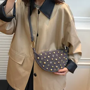 Vintage dark grey crescent bag with metallic rivets and hollow eyelets for women