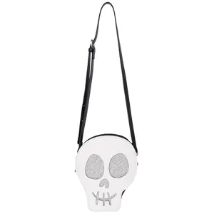 Skull crossbody bag in white PU leather with silver glitter eyes and black adjustable strap