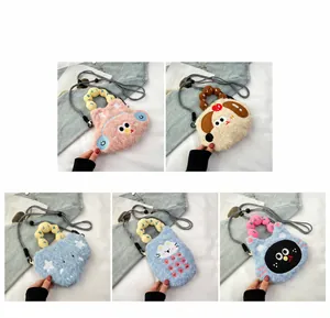 Detail of cute plush crossbody bags with cartoon designs and plastic letter handles