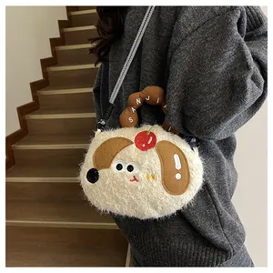 Detail of cute puppy plush crossbody bag featuring cherry patterns and embroidered handle