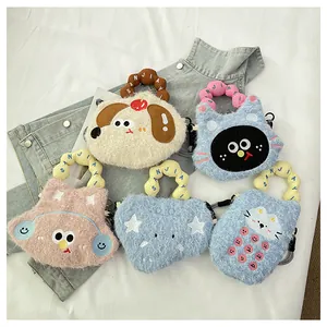 Detailed view of plush handbags featuring cute embroidered dogs and cats with bubble handles