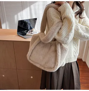Close-up of fluffy khaki plush tote bag showing soft faux fur texture and thick handles