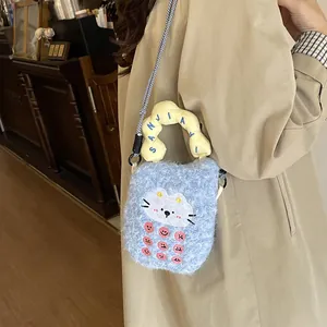 Cute blue plush cat crossbody bag with yellow handle and stylish braided shoulder strap