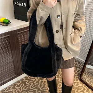 Fuzzy black plush tote bag for women with wide shoulder strap for winter season