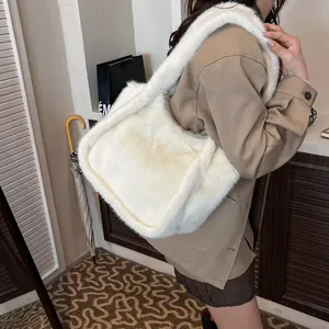 Faux fur white tote bag with wide shoulder strap for winter minimalist fashion
