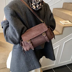Vintage brown matte suede messenger bag with flip cover and double metal buckles