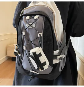 Close-up of the grey canvas bag with adjustable bungee cords and Linkbox logo detail