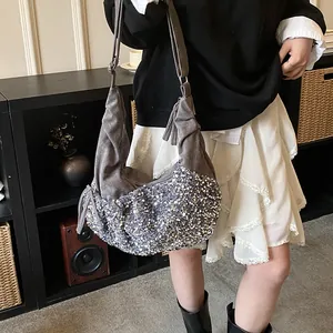 Chic crescent moon shoulder bag featuring grey suede and sparkling silver sequins finish