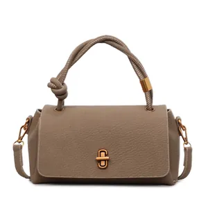 Taupe litchi pattern leather handbag with twisted handle and gold rectangle lock closure