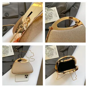 Detail view of champagne glitter evening bag showing gold handle and chain strap