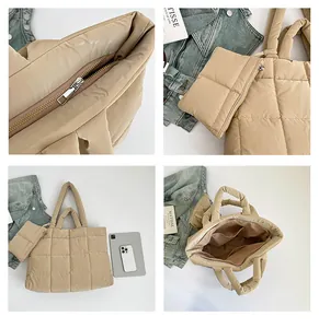 Détails du sac fourre-tout matelassé beige avec fermeture éclair et poches internes