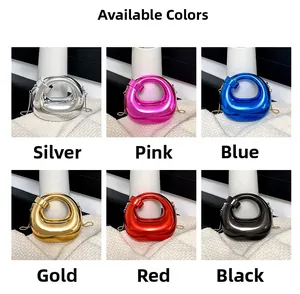 Macro view of mirror finish acrylic crescent bags in six vibrant metallic colors with chain straps