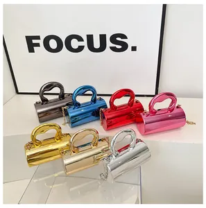 Showcase of seven colorful cylinder bags with mirror finish and thick ring handles