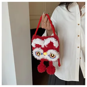 Detailed embroidery and soft faux fur texture of the festive red lion dance handbag