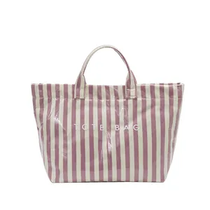 Sac fourre-tout à rayures violettes et blanches avec finition brillante imperméable