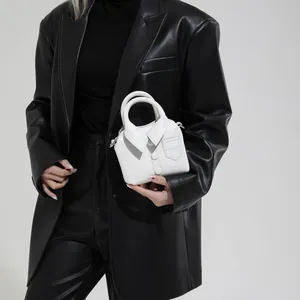 White shirt-shaped mini handbag with collar detail and black buttons for women