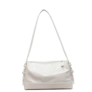 Minimalist beige pillow shoulder bag made of smooth PU leather with top zipper closure